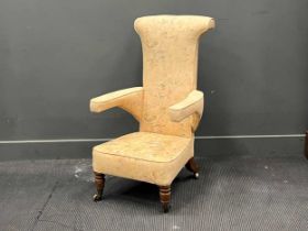 A Victorian Prie dieu chair in floral cotton covering, with turned mahogany legs, M H Ayres patent