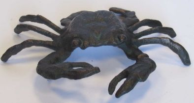 A bronzed metal model of a crab 21cm high