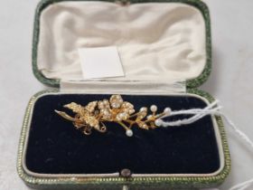 A diamond and split pearl flower brooch, tested as 9ct gold, weight 5.1g