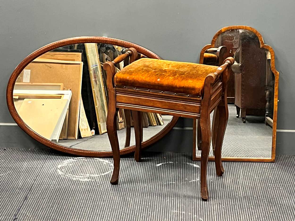 An Edwardian oval inlaid mahogany wall mirror 64.5 94cm together with an arched wall mirror top 71 x