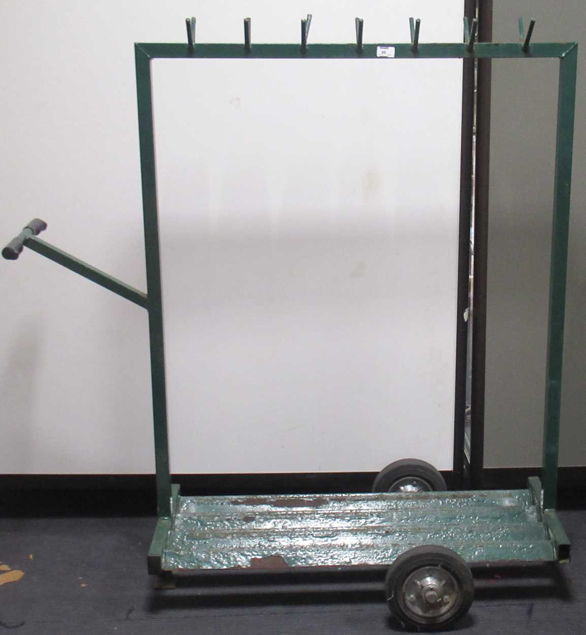 An industrial luggage trolley with 14 point hanging rail and under tier. 133 x 124 x 60cm