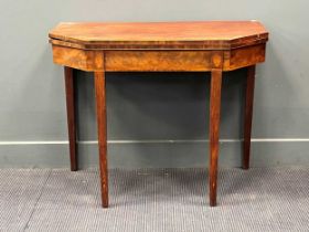 A George III line inlaid mahogany card table with canted rectangular top on tapered legs 73 x 92 x