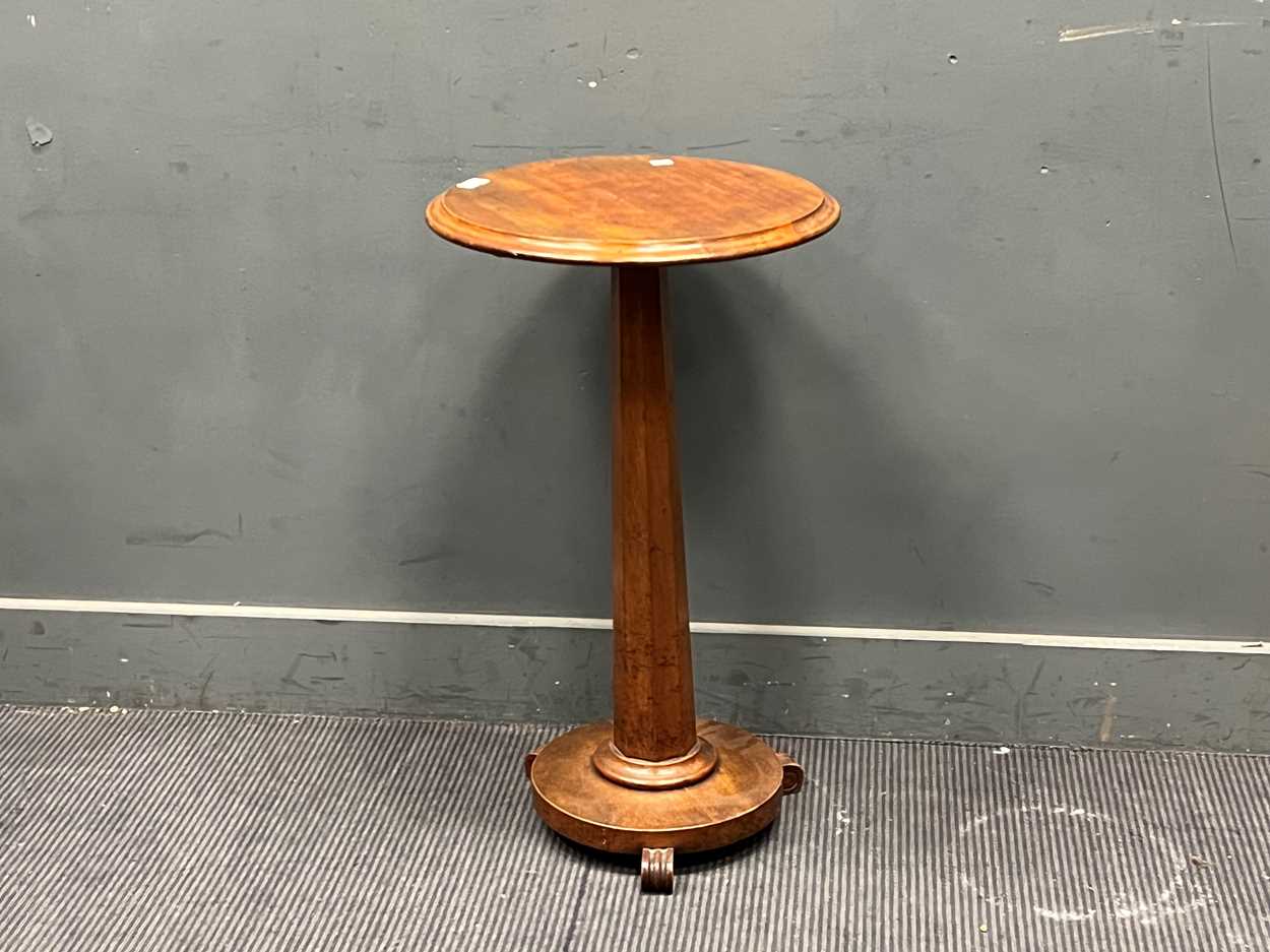 A 19th century mahogany occasional table, the circular top over a faceted column support 75 x 46cm