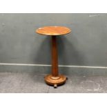 A 19th century mahogany occasional table, the circular top over a faceted column support 75 x 46cm