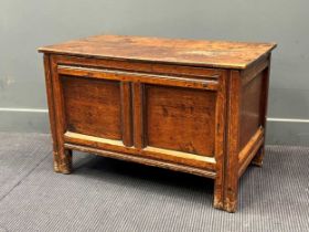 An oak two plank top blanket box with chip carved edge, early 18th century, 56.5 x 89 x 47cm