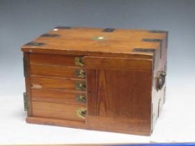 An Edwardian pine canteen box with a silver plated part service of flatware contents (lacks a door)