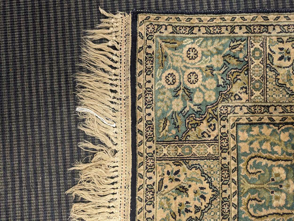 A silk Turkish Hereke rug with a blue and green ground colour 135 x 77 cm The rug is heavy - Image 5 of 8