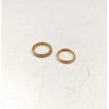 Two hallmarked 22ct gold wedding bands, gross weight 6.9g