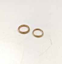 Two hallmarked 22ct gold wedding bands, gross weight 6.9g