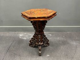 A Chinese marquetry inlaid occasional table, the hexagonal top decorated with a battle scene