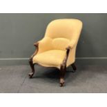 A Victorian walnut library armchair, with floral carved cabriole legs 90 x 67 x 63cm