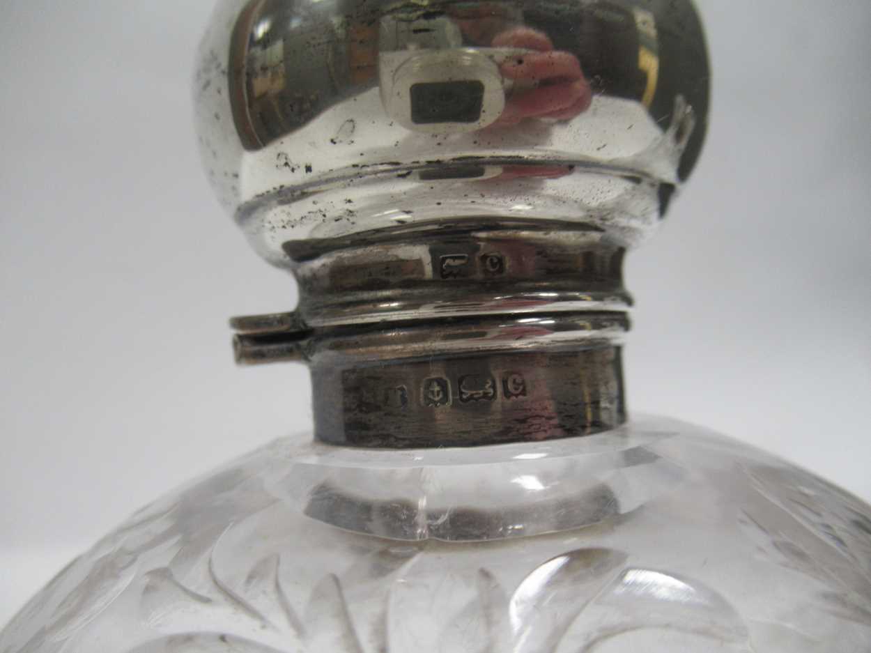 A silver mounted glass dressing table bottle, the glass etched with a spider in a web, together with - Image 4 of 8