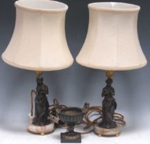 A pair of bronze lamps modelled as classical figures, with marble bases; together with a small