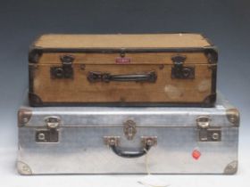 A hessian wrapped suitcase by Icare of 2 Rue Chateaudun, Paris, 387 x 20 x 60, together with an