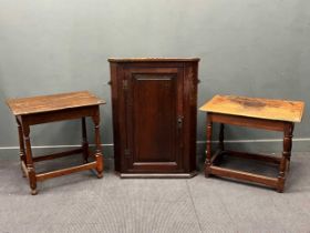 A late 17th or 18th century oak centre table with turned leg and three plank top, alterations.