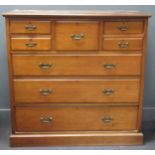 An Edwardian Maple & Co mahogany chest of drawers, with a combination of five short over three