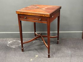 An Edwardian mahogany envelope card table with single drawer on square tapered legs 75 x 57 x 57cm