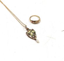 An opal, pearl and enamel pendant tested as 9ct gold on a hallmarked 9ct gold chain gross weight 3.