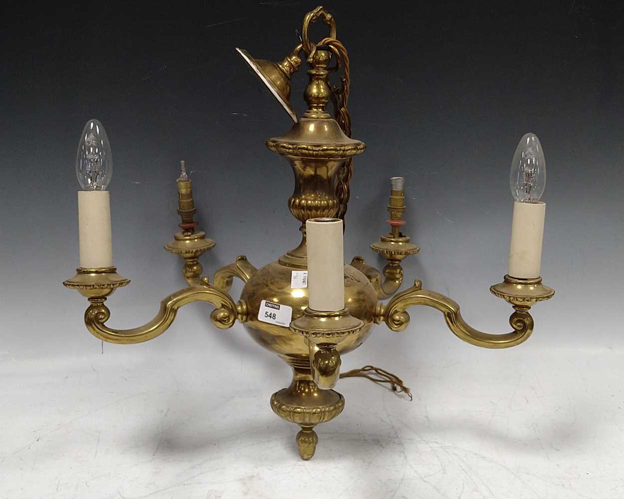 A brass five light chandelier, together with four brass wall sconces