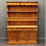 A 20th century pine dresser with shelf back, 144cm wide, 198cm high
