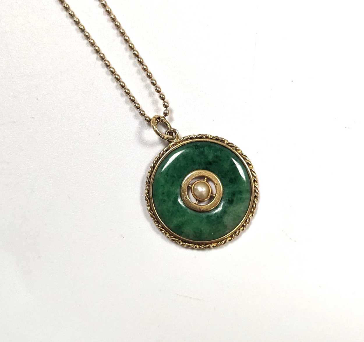 A jade pendant on a hallmarked 9ct gold chain, a chain tested as 9ct gold, an intaglio ring tested - Image 3 of 3