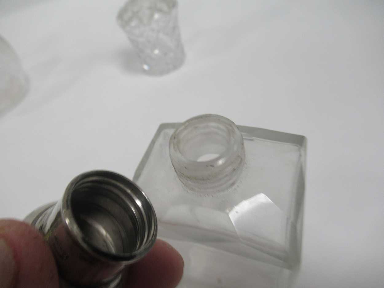 A silver mounted glass dressing table bottle, the glass etched with a spider in a web, together with - Image 5 of 8