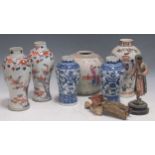 A pair of imari baluster vases and a pair of Chinese blue and white vases; a Chinese ginger jar