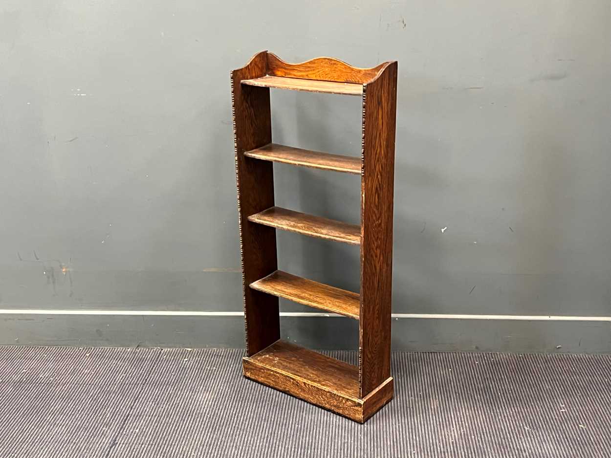 An oak Arts and Crafts book shelf with four open shelves and pierced arched sides 125 x 61 x 21cm, - Image 2 of 4