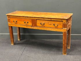 A 19th century and repaired pine dresser, two drawers, on raised feet, 75 x 140 x 42cm