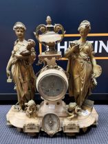 A gilt metal and marble figural mantle clock with classical figures and winged cupids 46cm high Japy