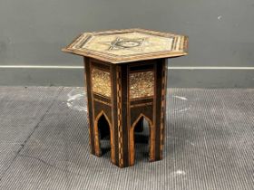 A Middle Eastern mother of pearl inlaid hexagonal occasional table, circa 1900, 51 x 50cm