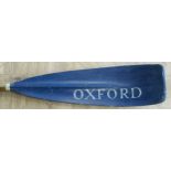 An Oxford wooden rowing oar with painted blade 294cm long