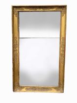 A French gilt framed rectangular wall mirror, 19th century,