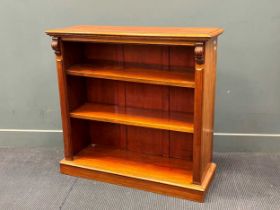 A 19th century mahogany open bookcase, with two adjustable shelves on a plinth base 94.5 x 98 x