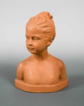 A Goldscheider terracotta bust of a young female nude,