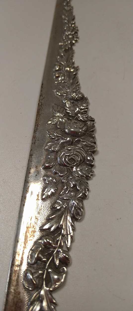 Kirk & Son, Baltimore - an American metalwares straight edge with foliate decoration, marked - Image 2 of 2