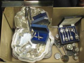 A collection of silver plated wares including entrée dishes, cruet stands, flatware, bottles etc