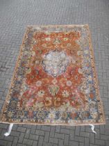 A Tabriz rug, 335 x 222cm The rug is heavy worn and has numerous areas of threadware and missing