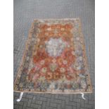 A Tabriz rug, 335 x 222cm The rug is heavy worn and has numerous areas of threadware and missing
