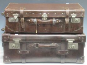 Two large leather strapped suitcases in dark brown leather, one stamped "SS KY" made by G Fowler and