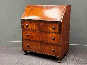 A 19th century mahogany bureau the fall front over three long drawers 108 x 91 x 48cm