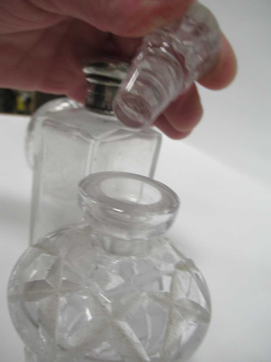 A silver mounted glass dressing table bottle, the glass etched with a spider in a web, together with - Image 7 of 8