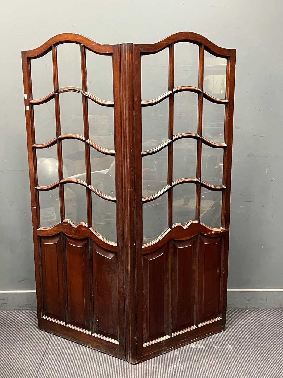 A 19th century mahogany two fold screen with glazed top and panelled lower half 184cm height, each