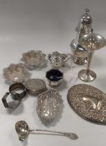 A collection of silverware including cruets, sugar caster, pin trays etc, 561.9g, (18ozt)