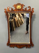 An American made Georgian style reproduction mahogany fretwork frame wall mirror, with gilt