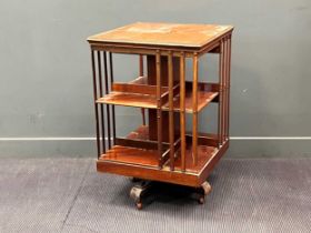 An early 20th century mahogany revolving bookcase, 92x 60 x 60cm