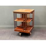 An early 20th century mahogany revolving bookcase, 92x 60 x 60cm