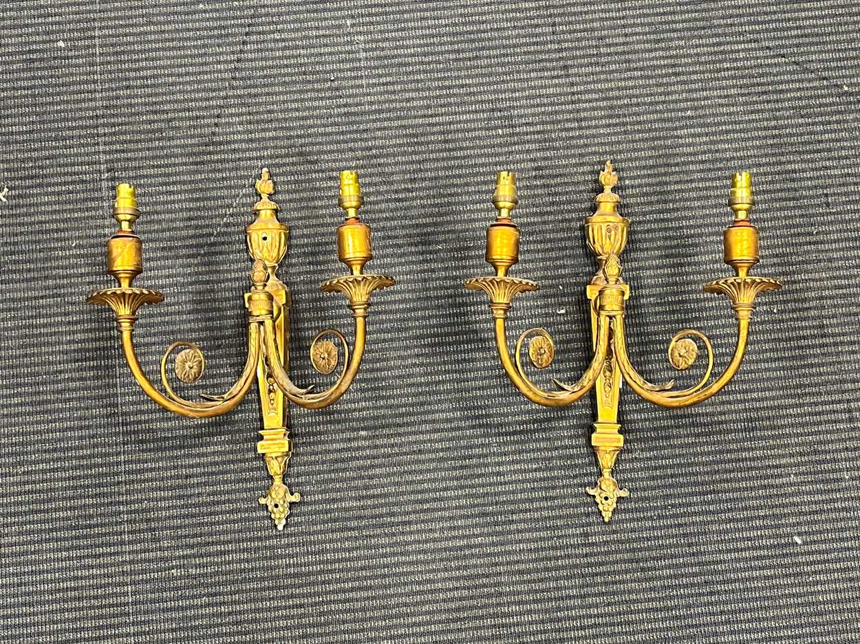 A pair neo classical style of gilt metal twin branch wall lights 36 x 28cm