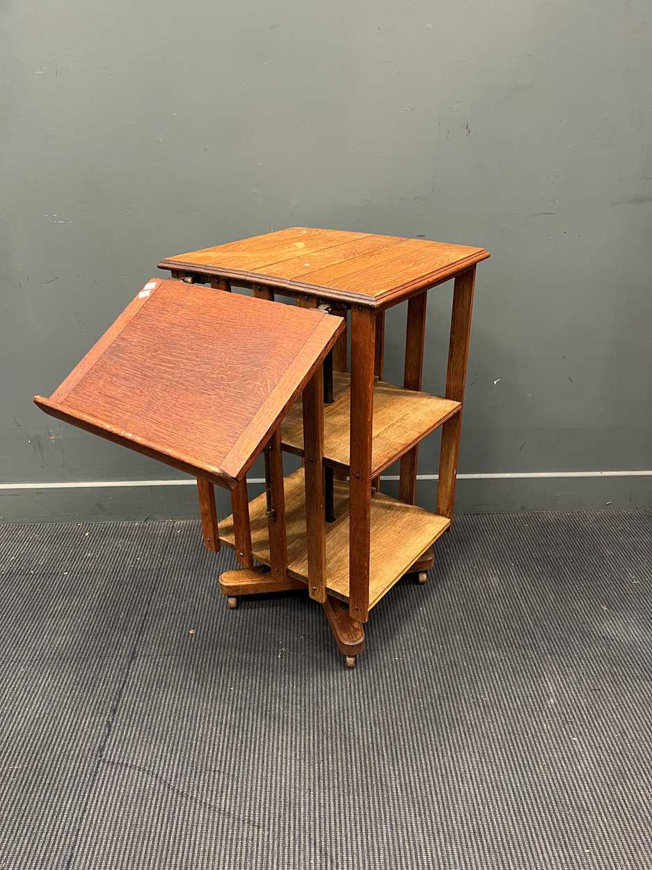 An early 20th century oak revolving bookcase, with an adjustable book rest, on castors 91 x 54 x - Image 3 of 3