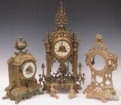 A brass gothic style mantle clock 53 x 30 x 20cm and two others (3)